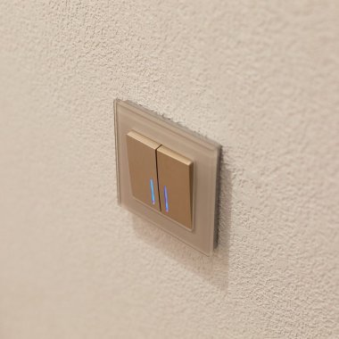 Фотография товара 'Werkel W1120110 Выключатель двухклавишный с подсветкой шампань рифленый'